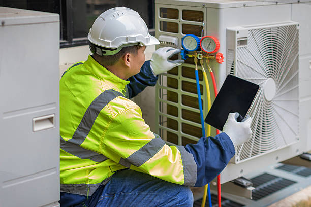 Professional Ac Installation technician working in Harper, KS